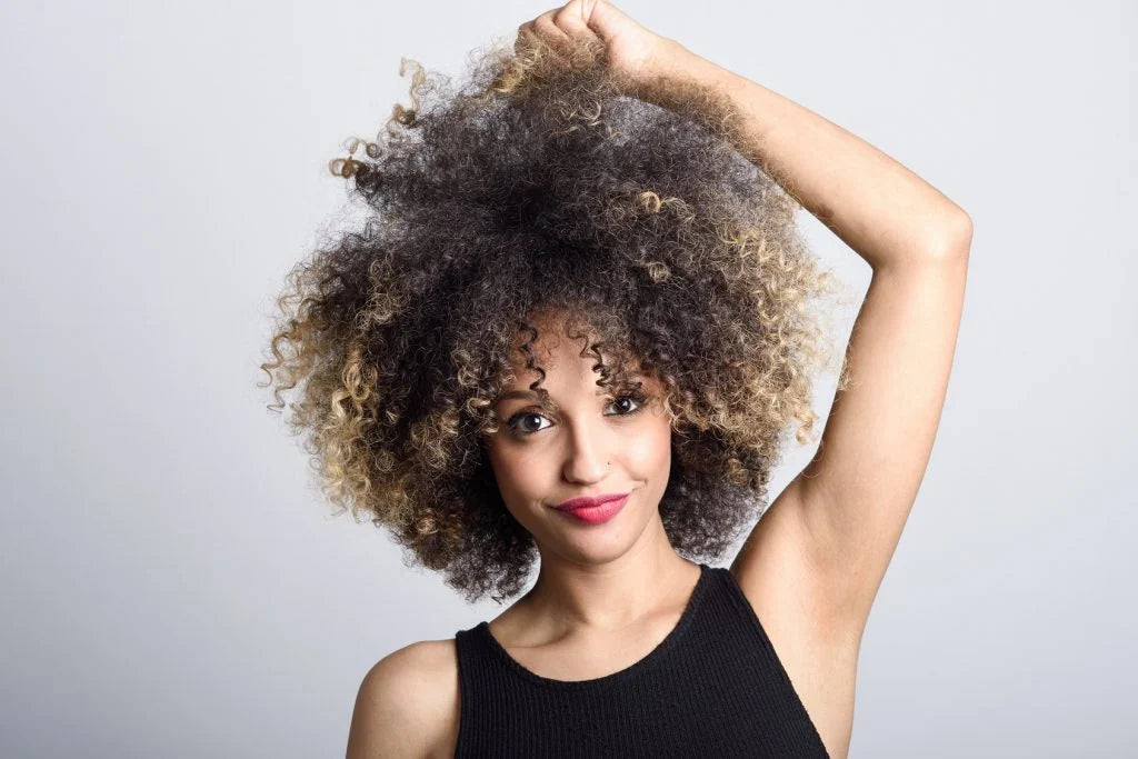 Come tagliare i capelli ricci